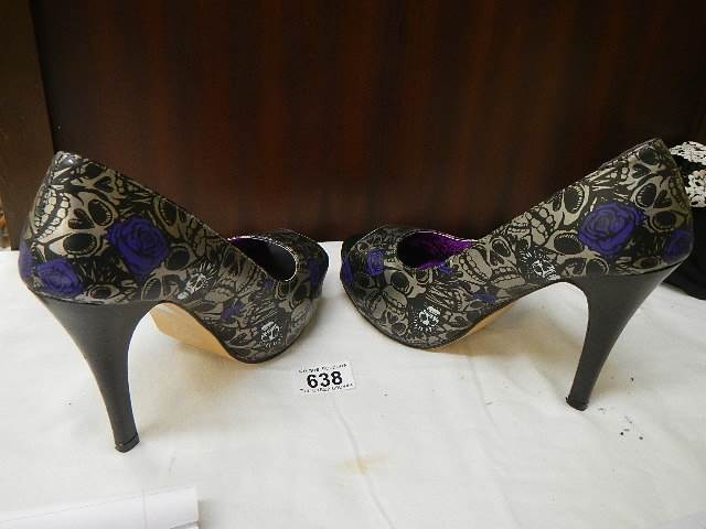 A pair of 'Iron Fist' high heel shoes. size 39.