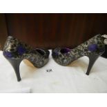 A pair of 'Iron Fist' high heel shoes. size 39.