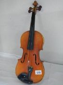 An old violin (a/f, needs strings etc.,).