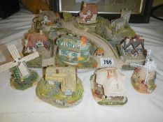 A quantity of Royal Doulton and other cottages COLLECT ONLY.