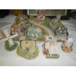 A quantity of Royal Doulton and other cottages COLLECT ONLY.