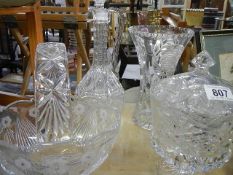 A cut glass claret jug, basket, vase and lidded bowl. COLLECT ONLY.