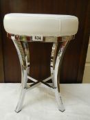 A mid to late 20th-century chrome stool with white seat. COLLECT ONLY.