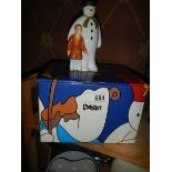 A boxed Coalport 'The Snowman' figure.