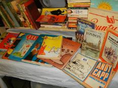 A mixed lot of books including Bunty, Andy Capp etc.,