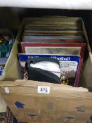 A box of LP records and CD's, COLLECT ONLY.