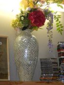 A tall silver coloured vase with faux flowers. COLLECT ONLY.