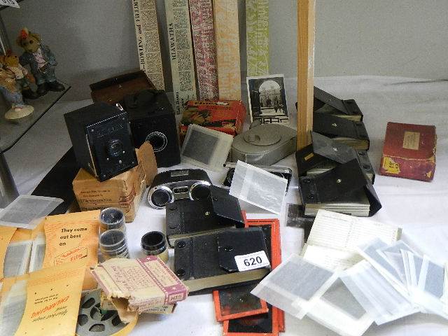 A mixed lot of old camera's and eight albums of negatives.