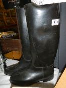 A pair of riding boots.