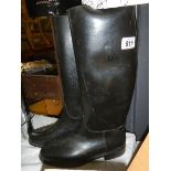 A pair of riding boots.