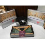 An Alba radio/CD player, 2 Boxed Christmas decorations and boxed oriental dishes.