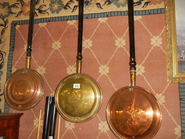 Two copper and a brass warming pan. COLLECT ONLY.