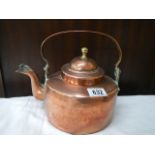 An early 20th century copper kettle.