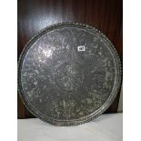 A large silver plate on copper Indian tray (plate badly worn). COLLECT ONLY.