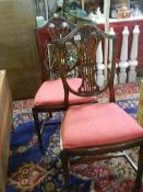 A pair of mahogany shield back chairs, COLLECT ONLY.