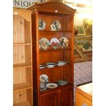 A mahogany bookcase with two door base. COLLECT ONLY.
