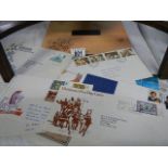 A quantity of first day covers.