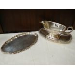 A good circa 1970's gravy boat on tray with a spare tray.