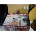 A boxed Fujifilm X2700 camera.