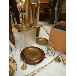 A mixed lot of brassware including chamber candlestick.