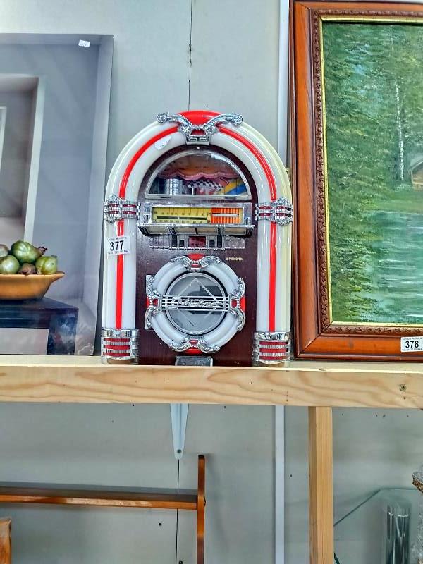 A jukebox radio/CD player, in working order. COLLECT ONLY.