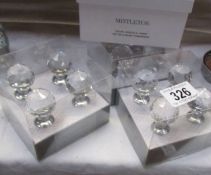 Three boxed sets of drawer knobs and a boxed set of 2 pomanders.