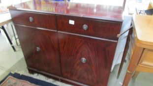 A mahogany 2 door 2 drawer sideboard. COLLECT ONLY.