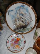 A large plate depicting a ship and a quantity of floral decorated plates, COLLECT ONLY.