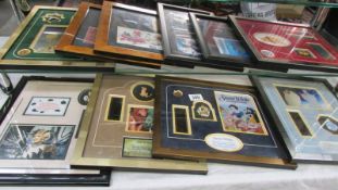 A quantity of framed & glazed limited edition Disney film cerlls, badges etc., COLLECT ONLY.