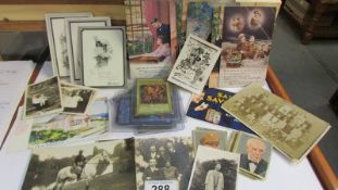 A mixed lot of postcards, photographs, collector's cards etc.,