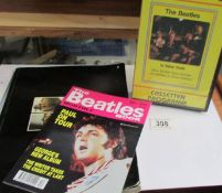 A Beatles in New York Video, The Beatles 'Get Back' book and a 2002 Beatles Monthly.