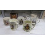 A quantity of George VI and Elizabeth II coronation mugs.