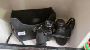 A cased pair of Hanimex binoculars.