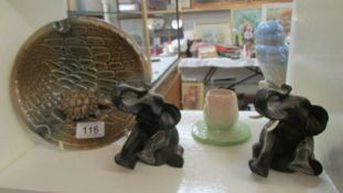 A Wade tortoise dish, a Carlton ware candleholder and two elephants.