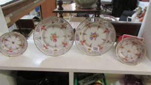 Two Bavarian ribbon plates with two matching dishes.