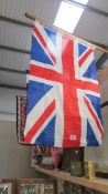 A quantity of flags including Union Jack in various sizes. COLLECT ONLY.