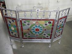 A stained glass triple fire screen. COLLECT ONLY.