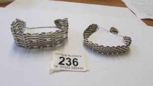 Two silver hall marked gate bracelets, 42 grams.
