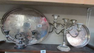 Two silver plate trays and two silver plate candelabra. COLLECT ONLY.