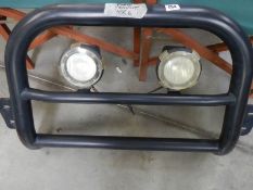 A Ford Transit Mk6 Bullbar with pair of H/D spot lamps. COLLECT ONLY.