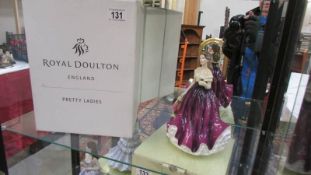 A Royal Doulton Pretty Ladies figure, 'Special Gift'.