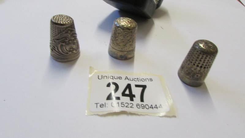 Three silver thimbles including one in case,. - Image 2 of 2