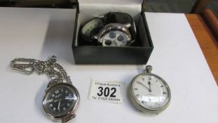 A Sekonda wrist watch, a pocket watch and one other watch.