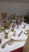 A mixed lot of brassware including horse and cart, animals etc.,