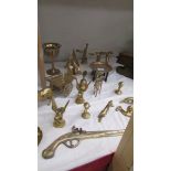 A mixed lot of brassware including horse and cart, animals etc.,