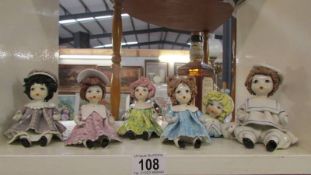 Six Italian doll figures.