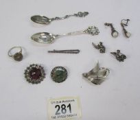 Two silver spoons and a mixed lot of silver and white metal jewellery.