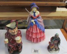 A Royal Doulton figure 'Victorian Lady' HN728, Falstaff jug and Good King Wenceslas HN3262.