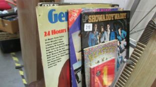 A quantity of LP's and CD's including Beatles, Shawaddywaddy, Gene Pitney etc.,