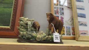 A Country artists bear and cub figure entitled 'An Early Catch'.